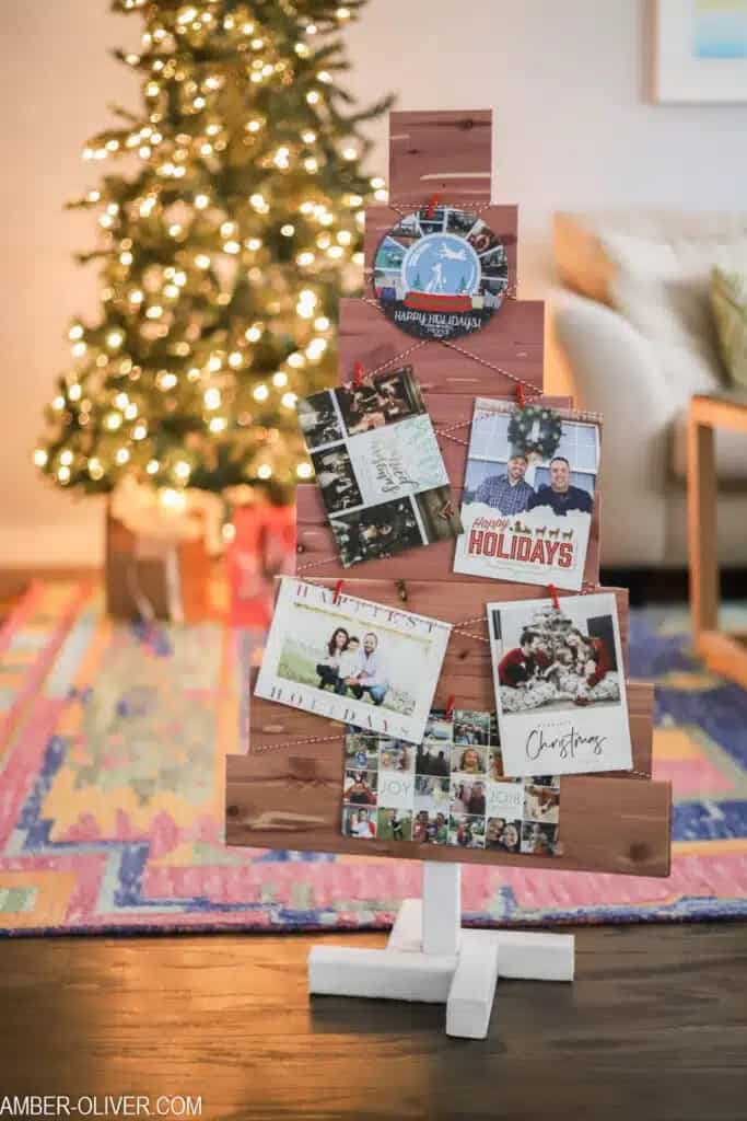 Small Christmas tree made from scrap wood used as a Christmas card holder.