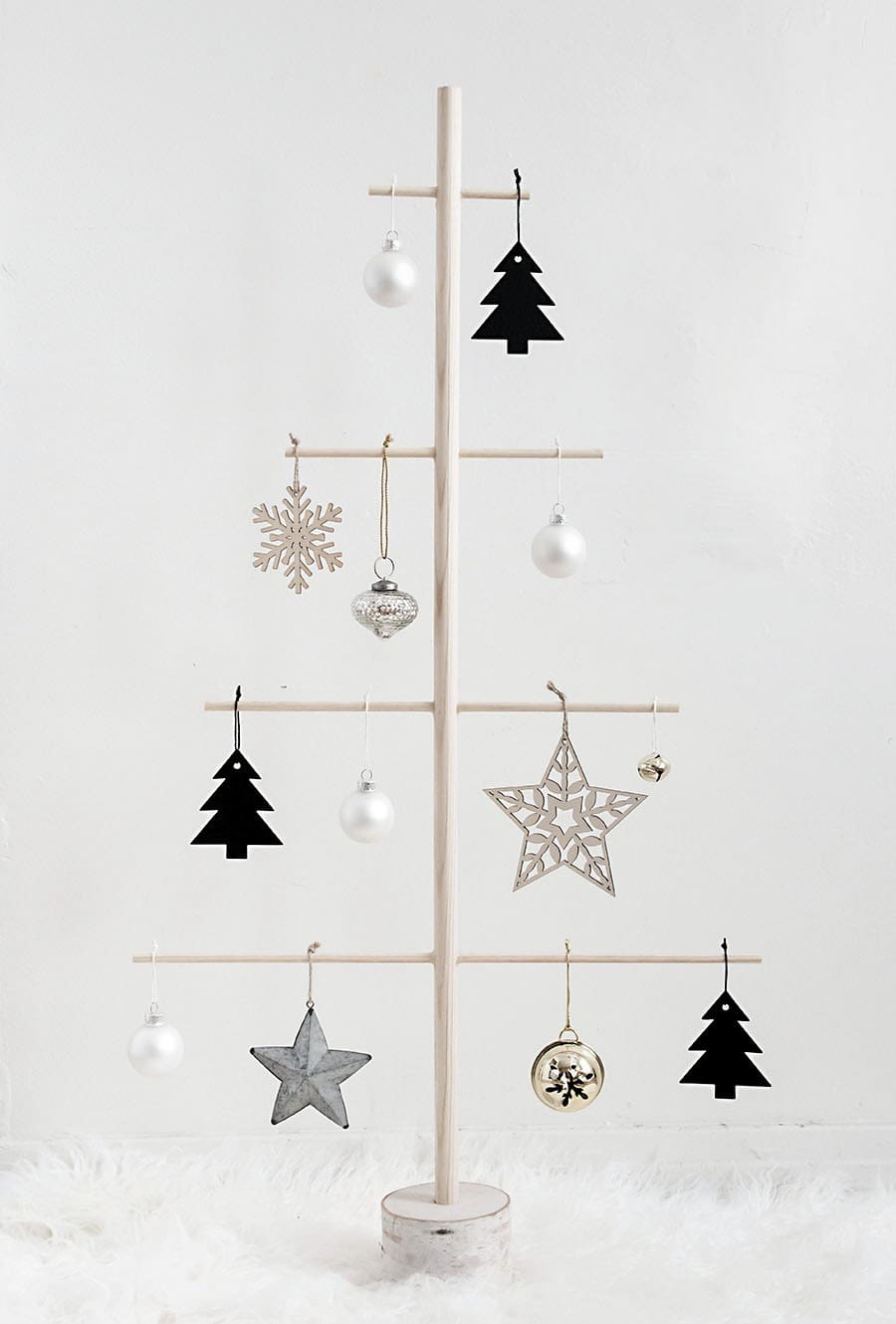 DIY wood dowel tree in black and white.
