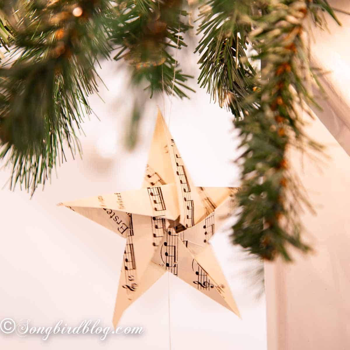 A paper star folded from sheet music paper.