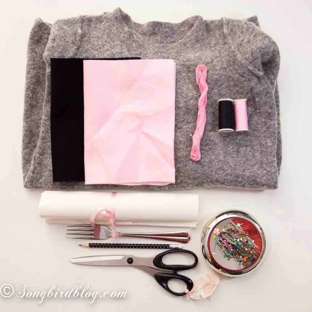 Materials for making grey felt Easter bunny bags.