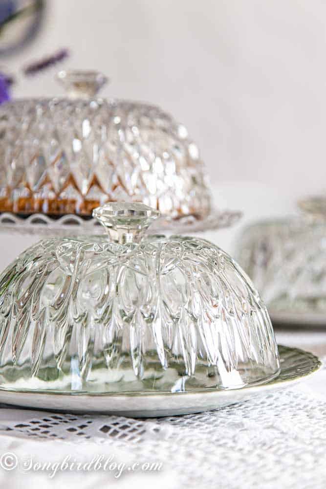 Crystal bowls upcycled into cake domes.