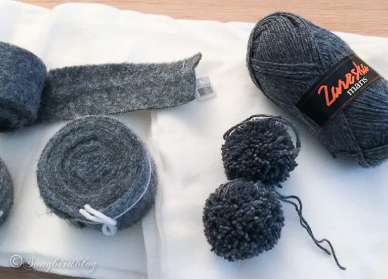 How to Make a DIY Fleece Blanket with Pom Poms Songbird
