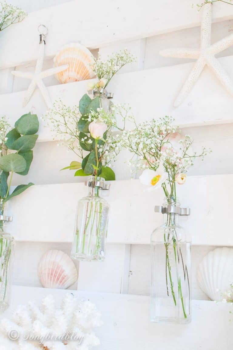bottles with soft pink flowers.
