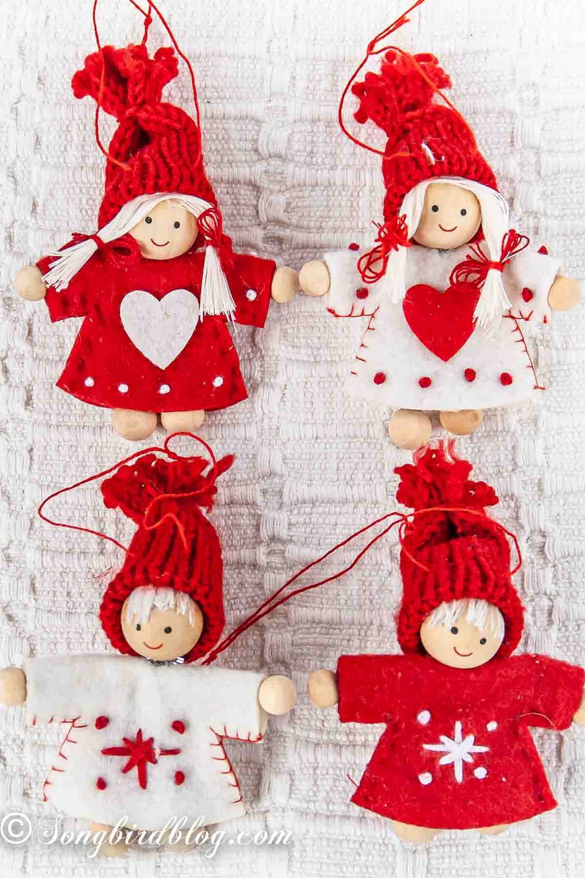 4 felt Christmas ornaments in red and white