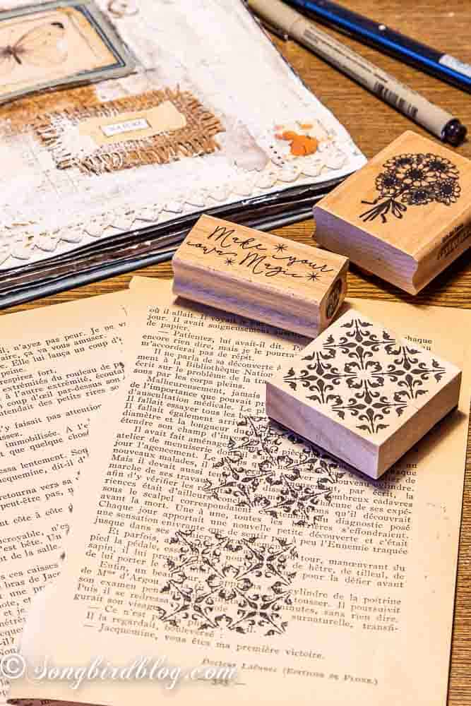 Close-up of vintage papers stamped with wooden stamps.